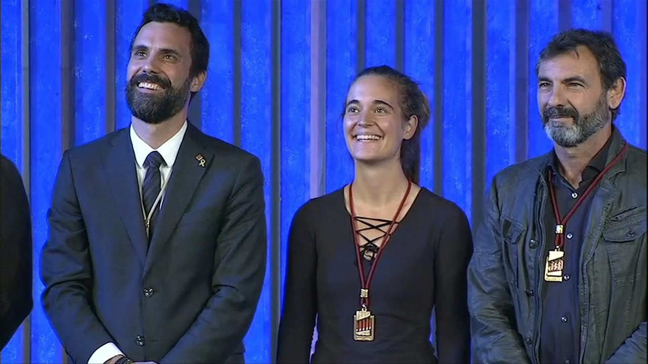 Migrant rescue ship activists receive Catalan medal of honour | AFP