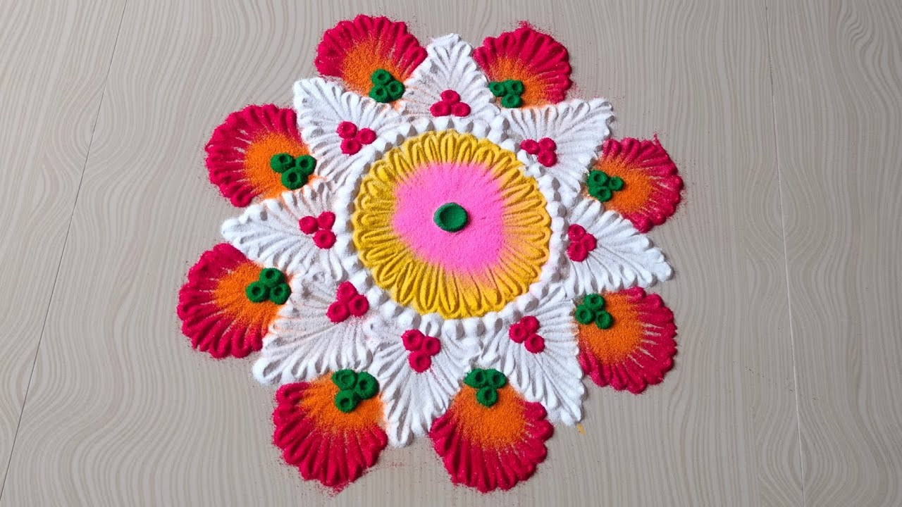 Attractive and elegant rangoli 😍.#rangoli #indianart #easyrangoli #rangolidesigns