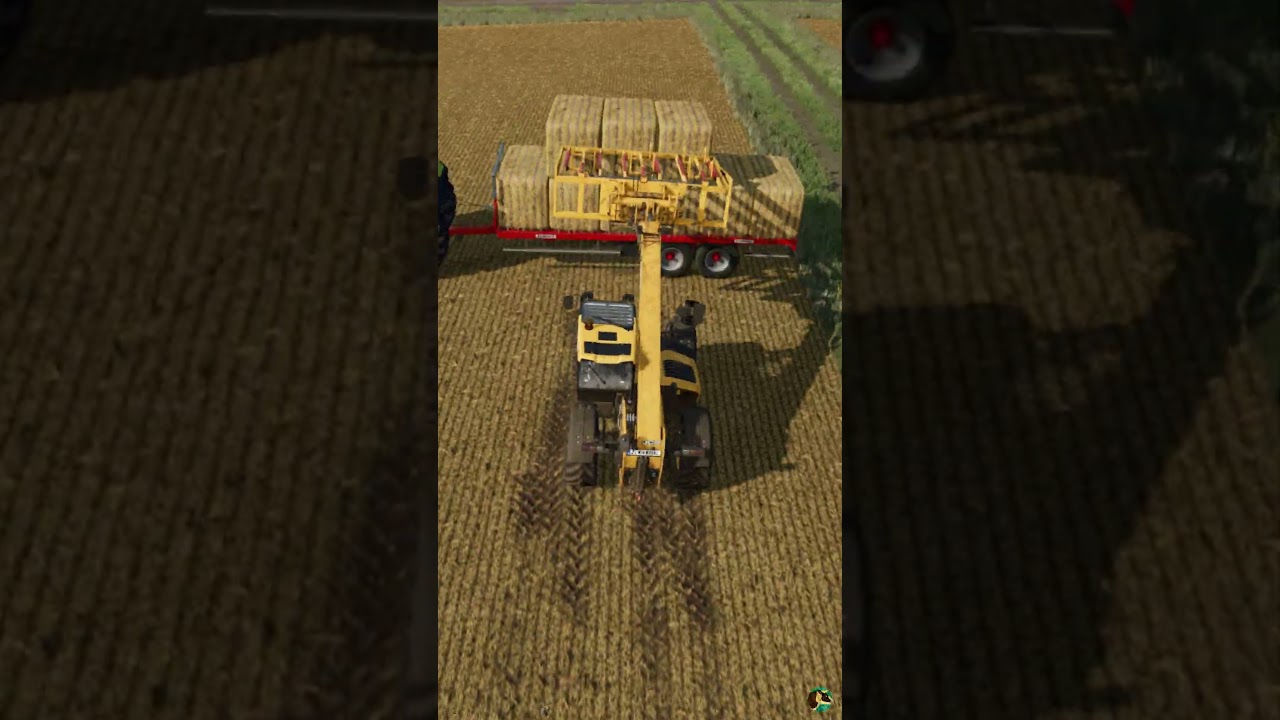 Loading Hesston Bales Onto A Red Rock Bale Trailer