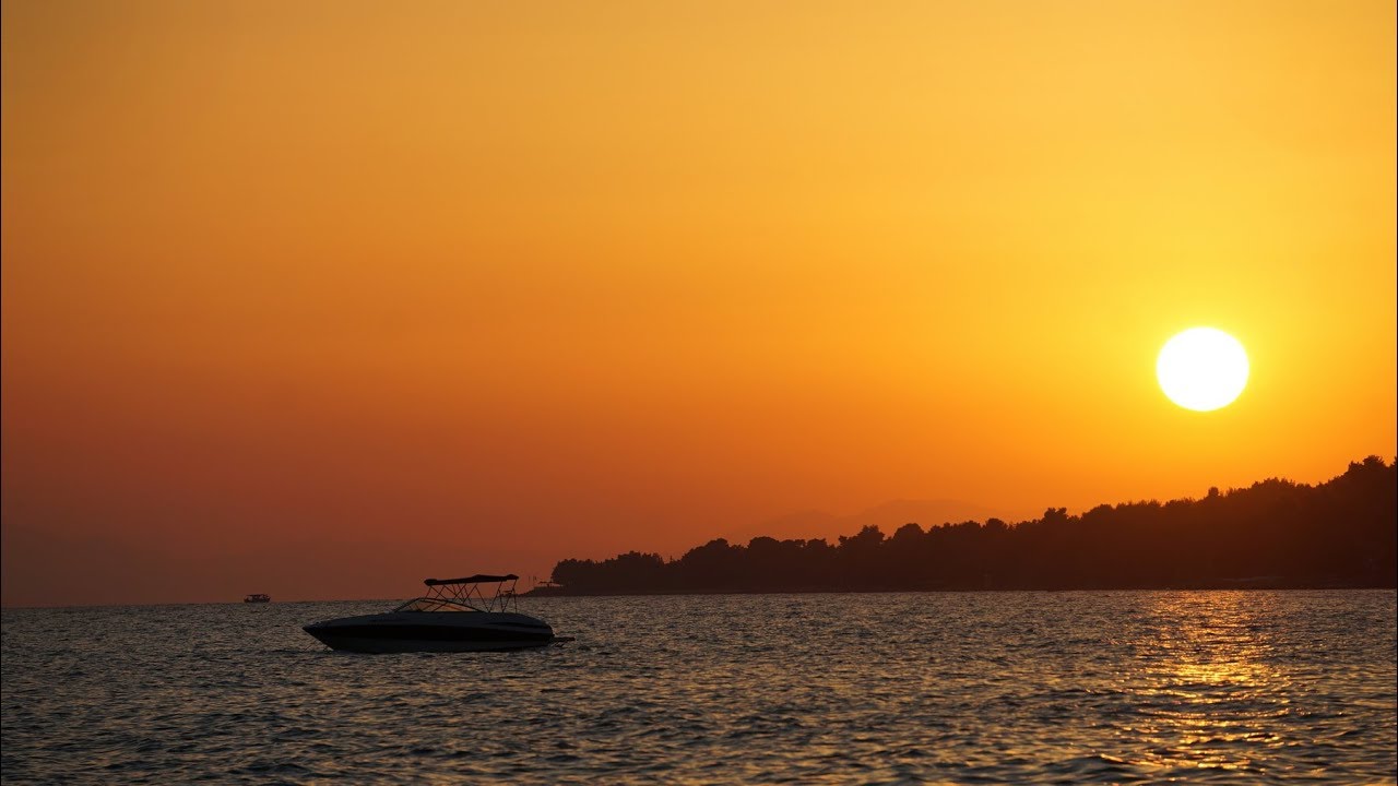 Закат на пляже отеля PORFI BEACH HOTEL, Ситония, Халкидики, Греция. Документально.№1
