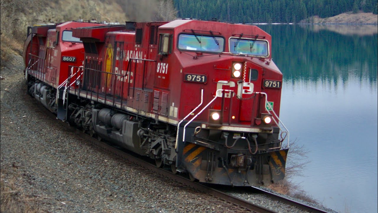 RARE!!! EX AWVR 777!!!! CP 9751, CP 8607, and CP 8880 lead CP 303 past Bearspaw, Calgary, Alberta!!