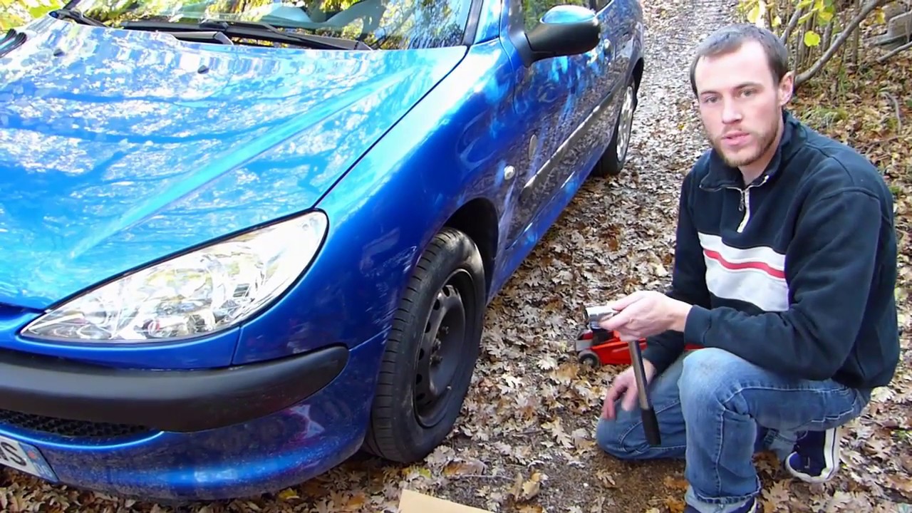 Как заменить тормозные диски и колодки на Peugeot 206