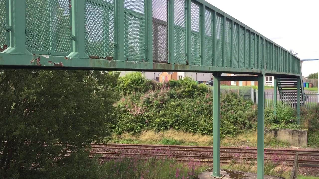 CS 73968 passes with BRAND NEW MK5 coaches working 5Z25 Polmadie Car M.D. to Aberdeen