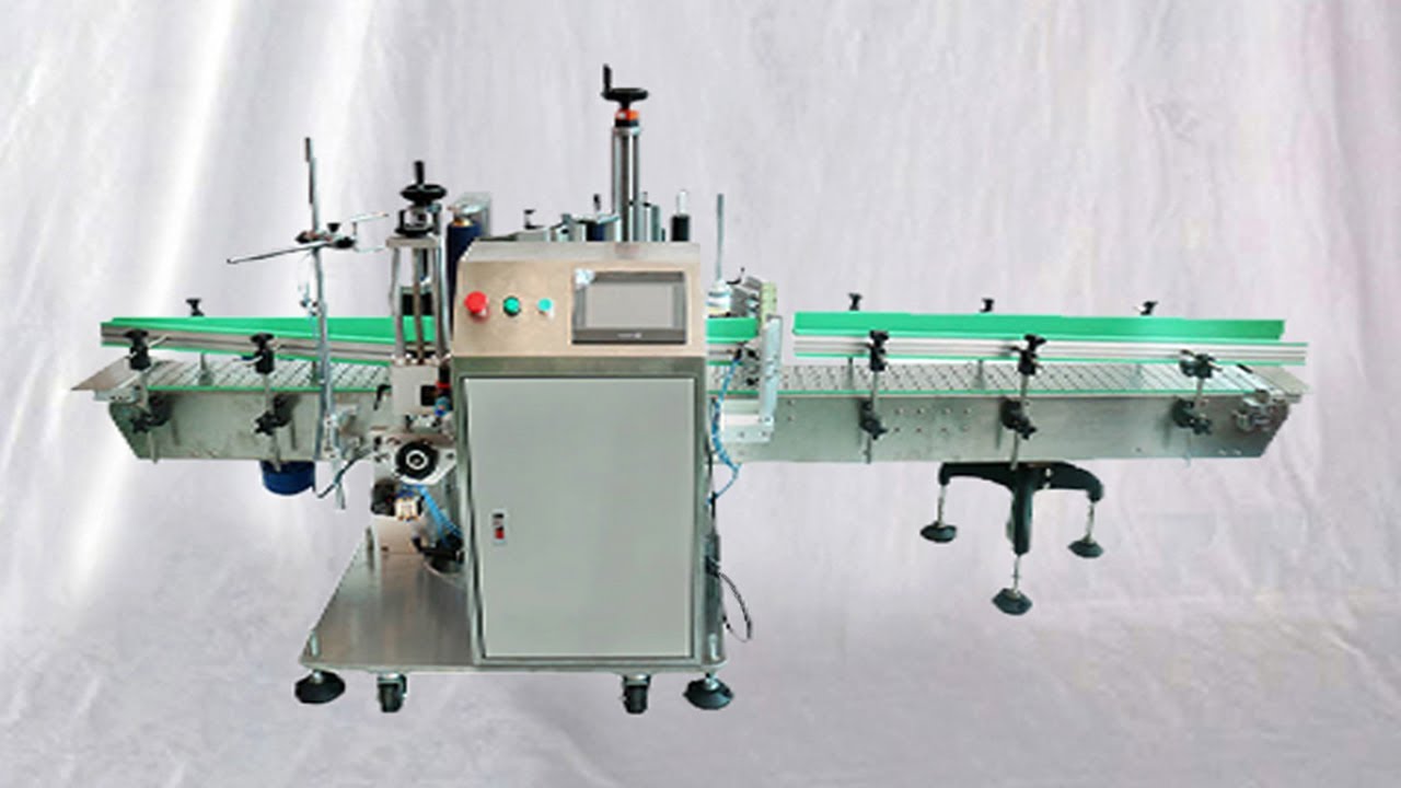 automatic fire extinguisher container labeling MC orientation sticker labeller étiqueteuse linéaire