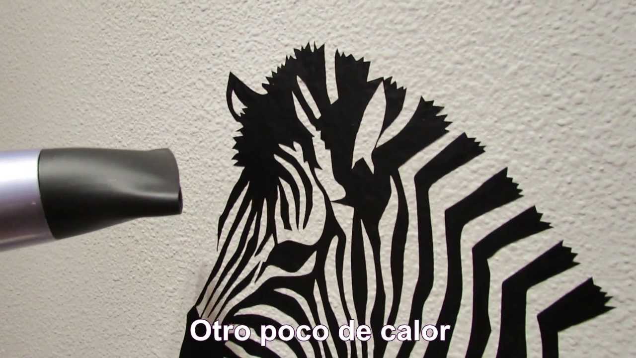 Instalación de vinilo decorativo sobre pared de gotelé
