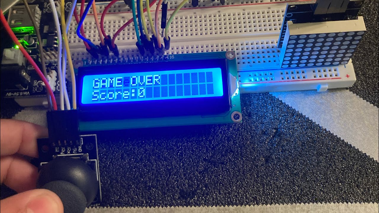 playing snake on arduino mega with max 7219,  joystick module, and LCD module