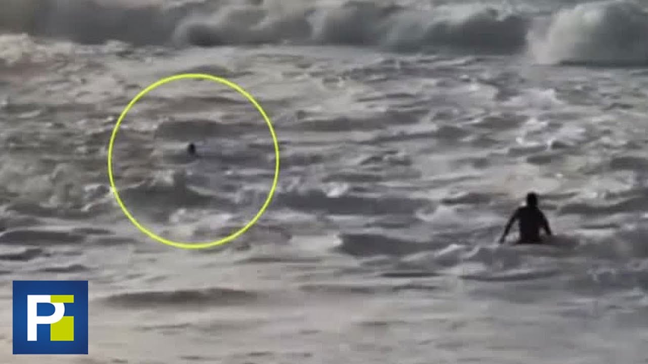Rescate de impacto: Surfista salva a una mujer de morir ahogada por olas de más de 15 pies de alto