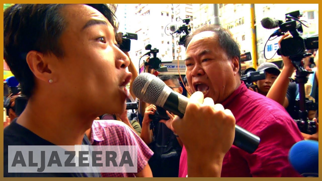 Hong Kong protests: Rival marchers square off against protesters