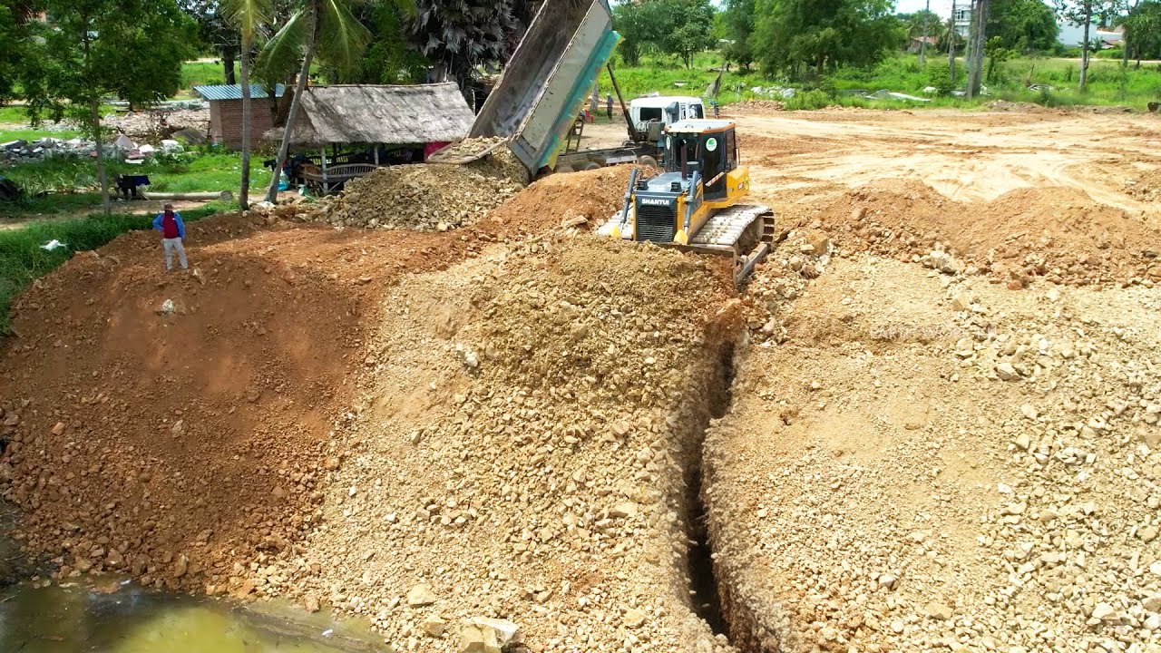 Perfectly Operation Landfilling Up in The Big Pond Use Dozer SHANTUI DH17C3 & Heavy Trucks Process