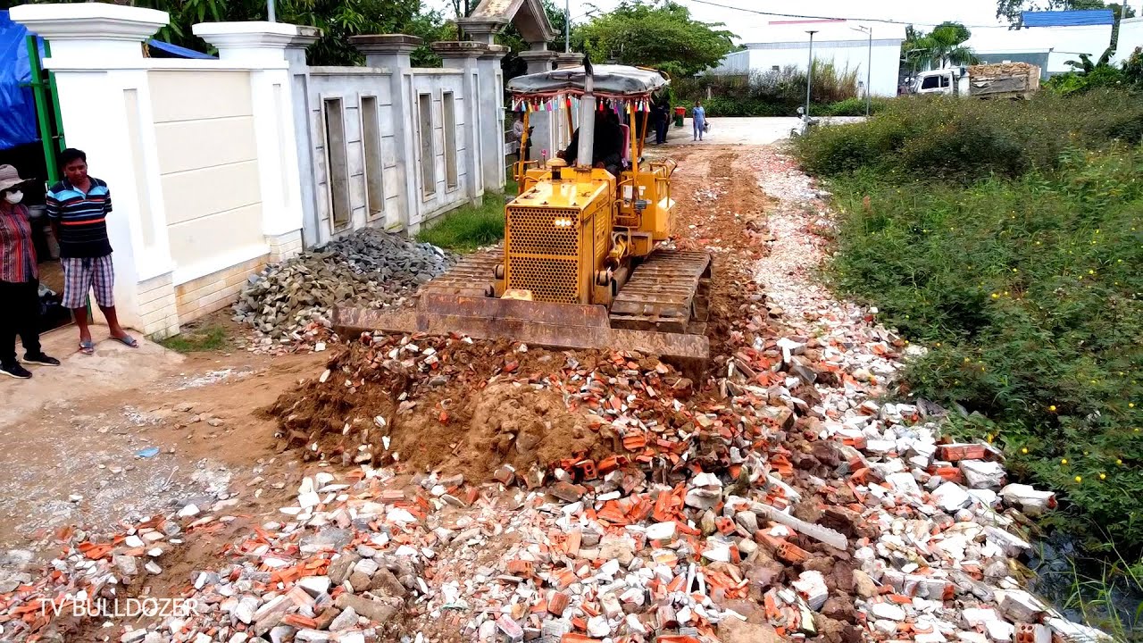 Wonderful Project LANDFILL & REPAIRING ROAD By Best Driver KOMATSU D31P DOZER Pushing STONE & Trucks