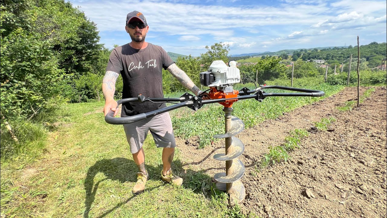 Making some holes with Stihl BT 360 earth auger.( Foreza de pamant cu burghiu de 250 mm in diametru)