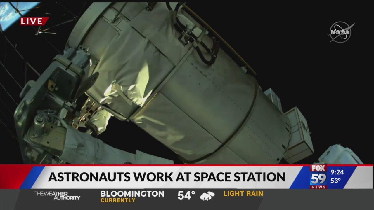 Astronauts work at space station