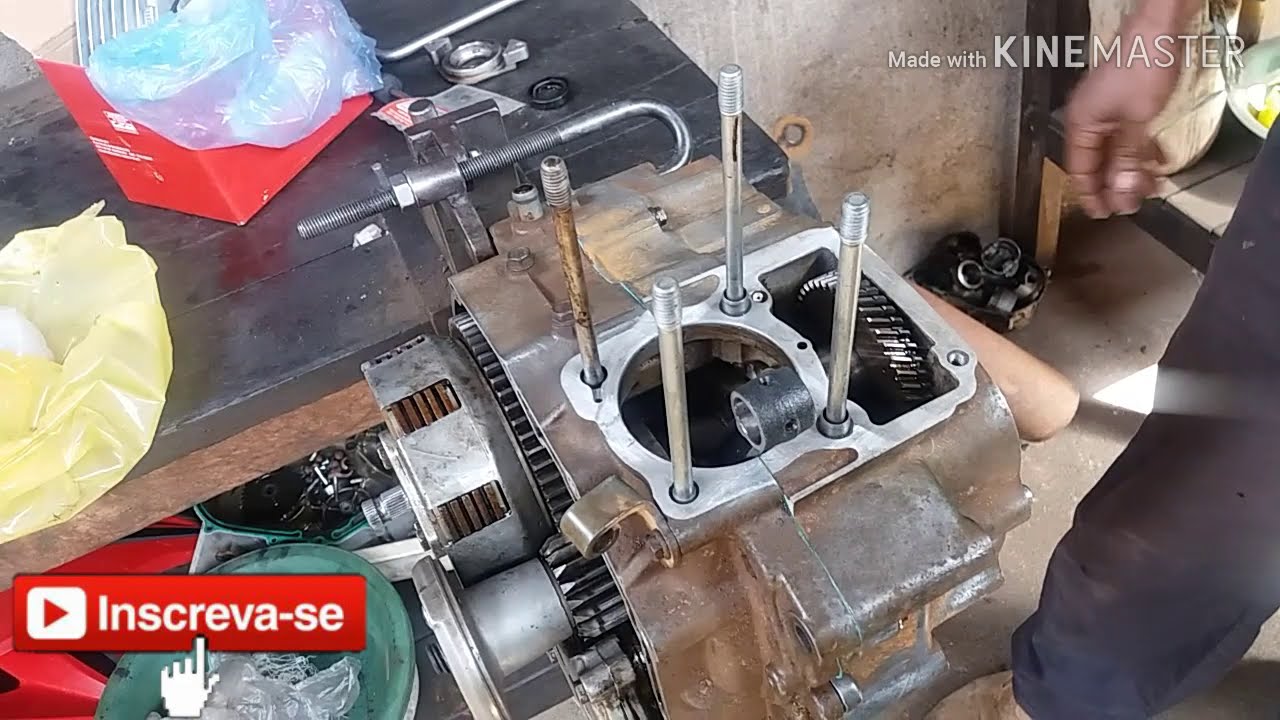 TIRANDO FOLGA DA ENGRENAGEM DO COMANDO DA CG 125.