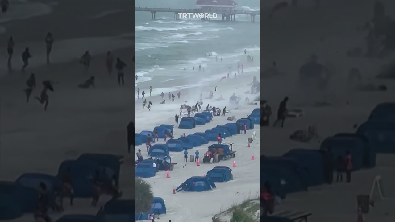 Waterspout comes ashore on a Florida beach