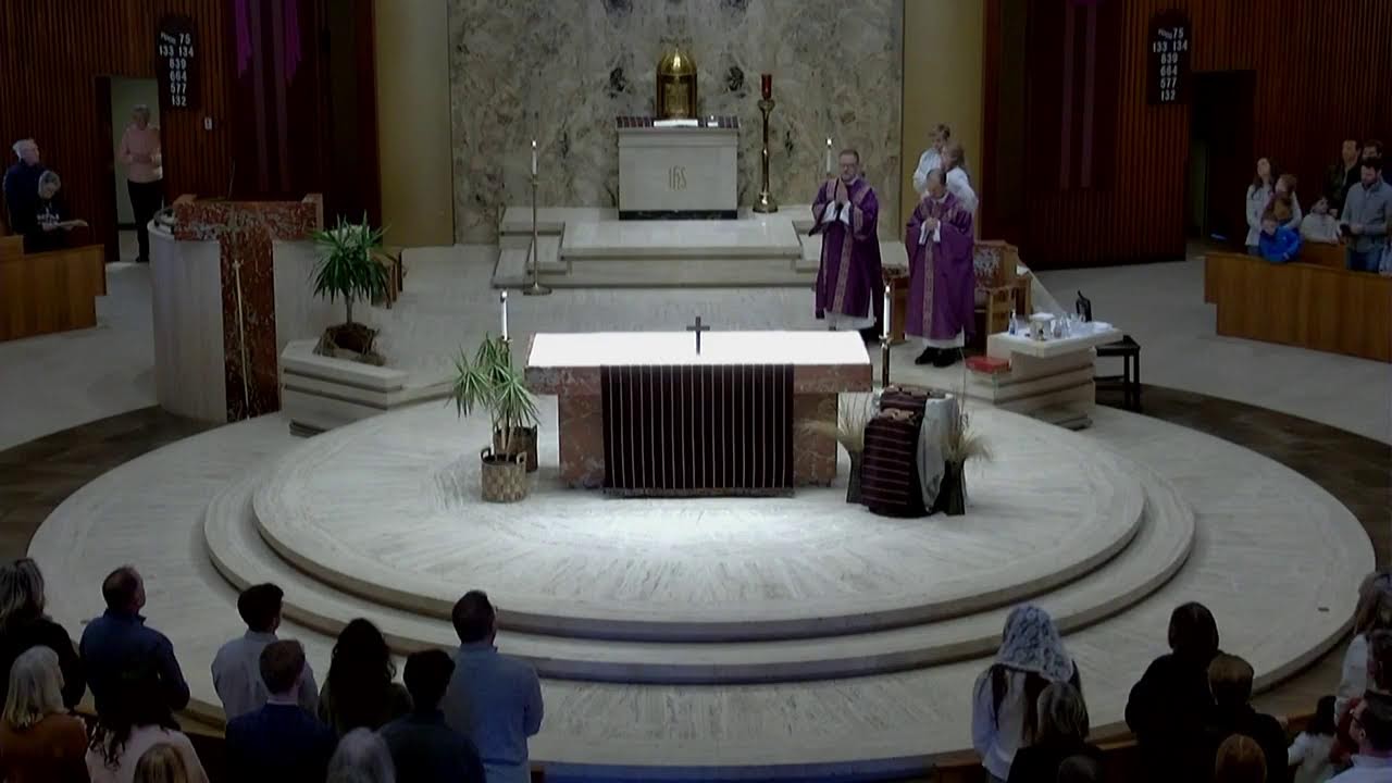 9:00am Mass