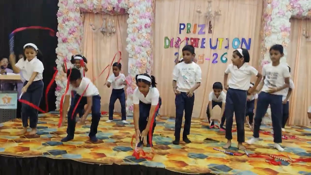 Dance by 2nd and 3rd std students on prize distribution by Rising Student 