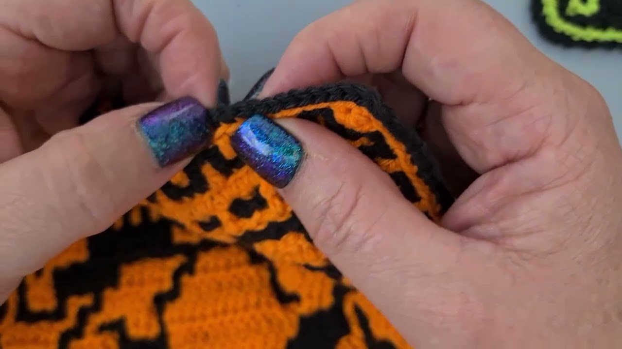 Mosaic border around solid interlocking haloweenies square introduction