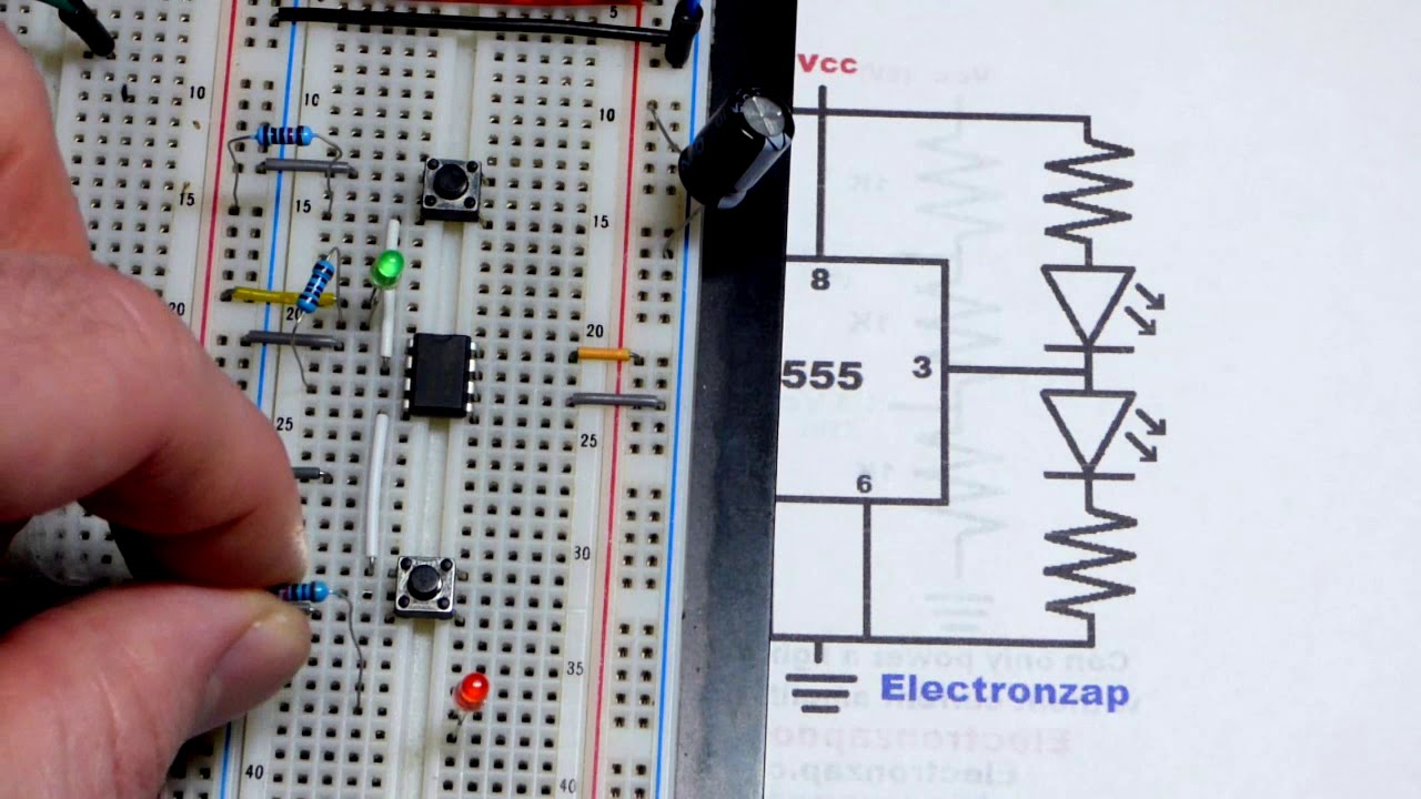 Quick 555 timer bistable flip flop mode circuit schematic to breadboard build by electronzap