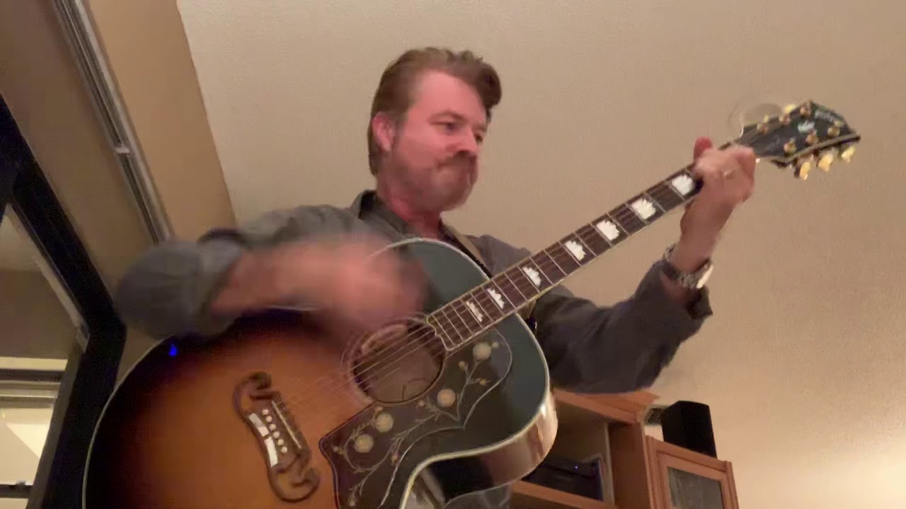 Tommy Overture Gibson J-200