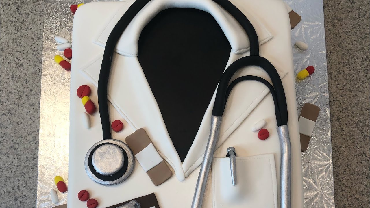 Doctors coat graduation cake