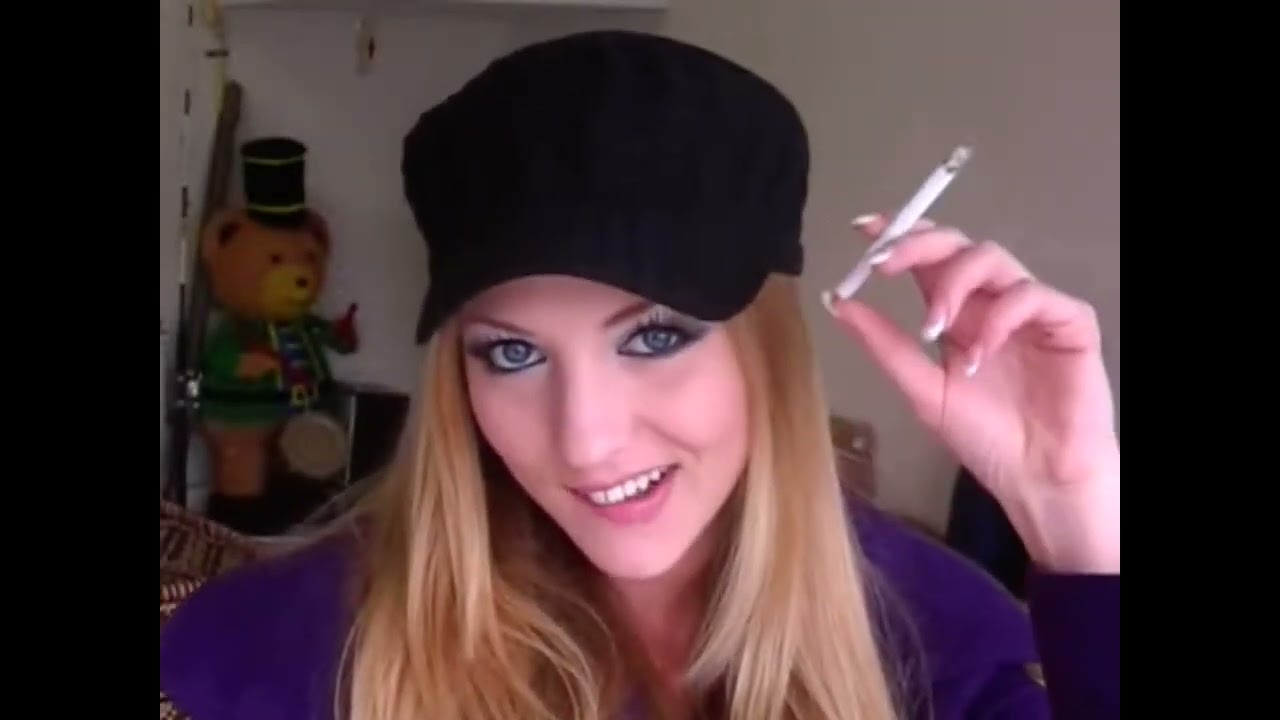 Pretty girl smoking and chatting