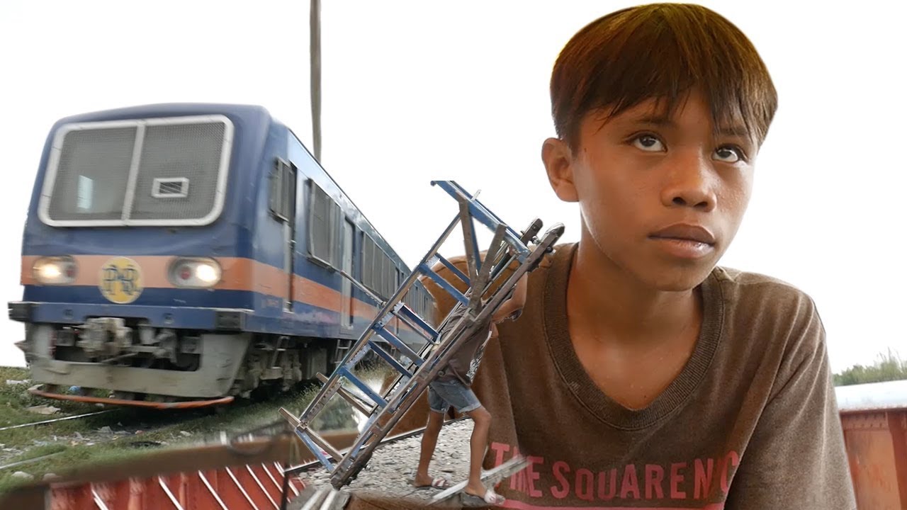 Meet The Manila Trolley Boys... Risking Their Lives On The Philippines' Train Tracks