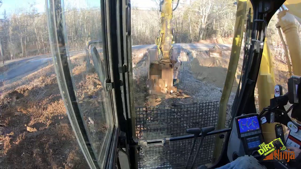 Komatsu PC360 Pulling Stumps