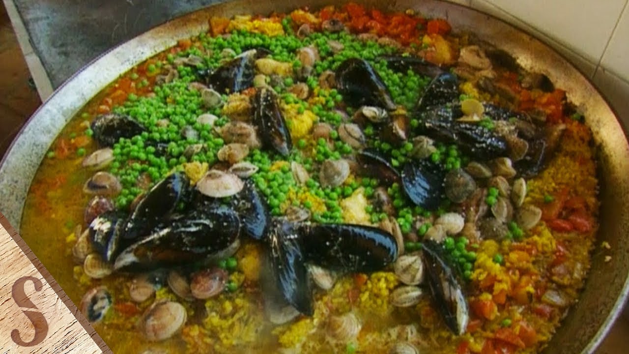 Spanish Culinary Delight: Chicken and Seafood Paella |Slice