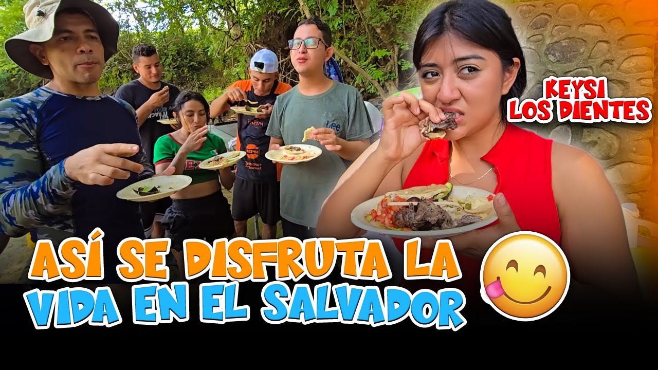 Compartiendo un rico almuerzo familiar en el río