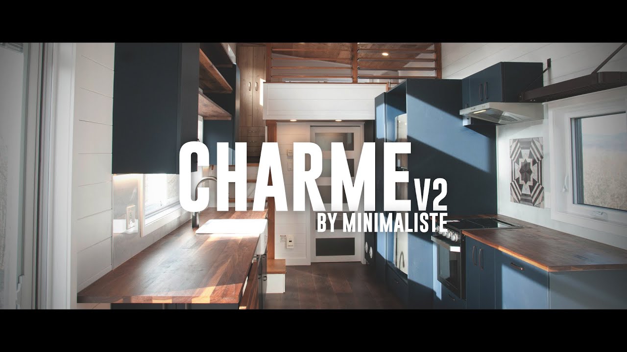 This well crafted tiny home features a downstairs bedroom and two lofts!