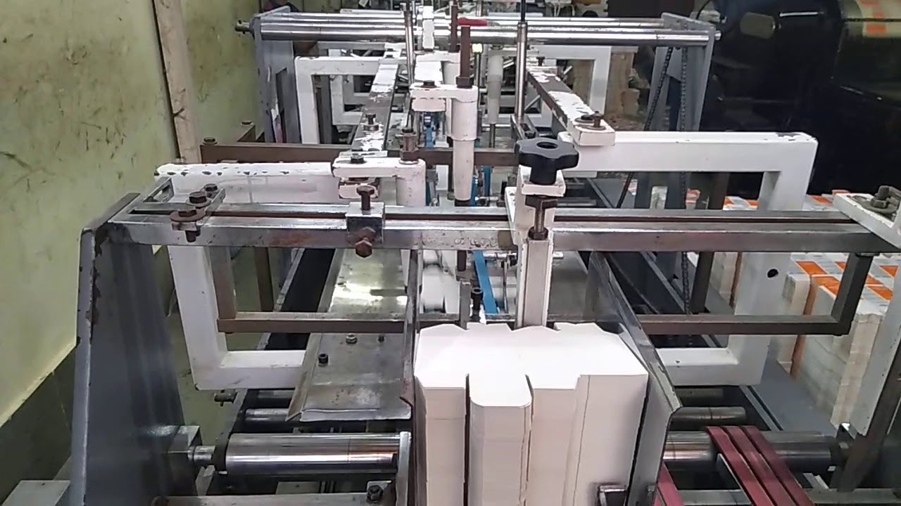Carton lock bottom machine