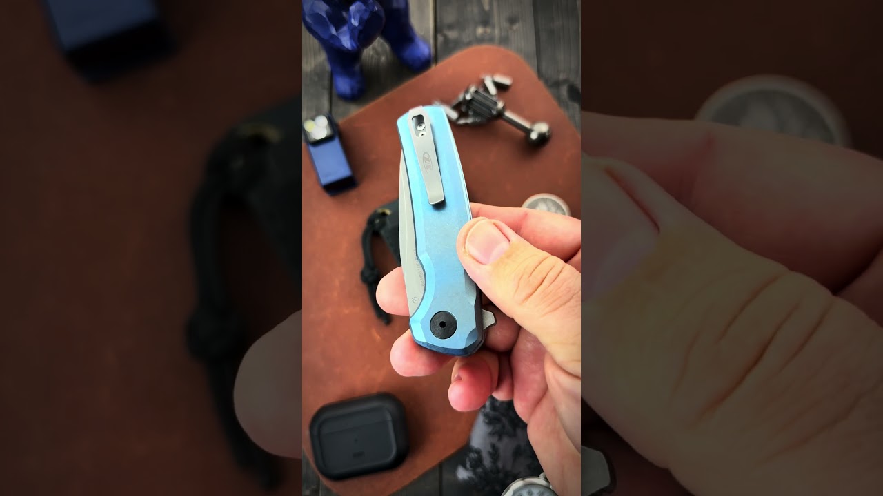Zero Tolerance 0044BLU - Blue Titanium Button Lock S90V - Available at GPKNIVES.com! #ZT