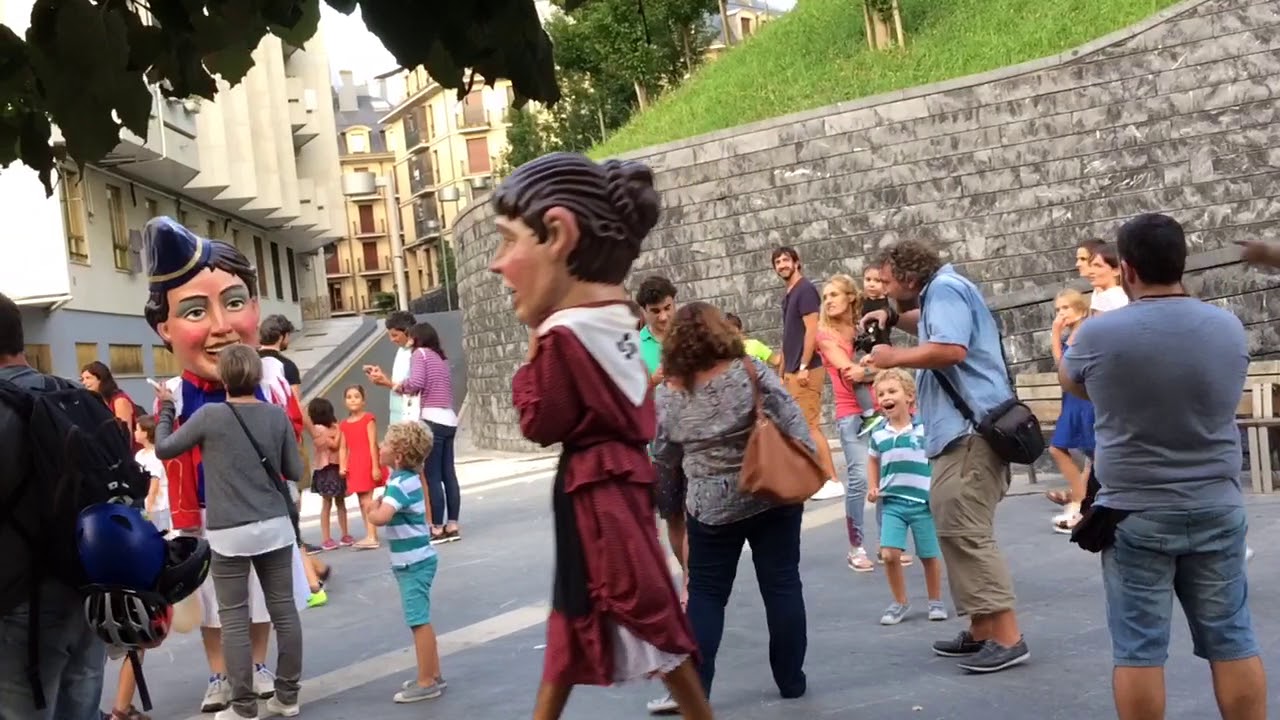 Cabezudo slaps someone with an animal bladder at Semana Grande in San Sebastian