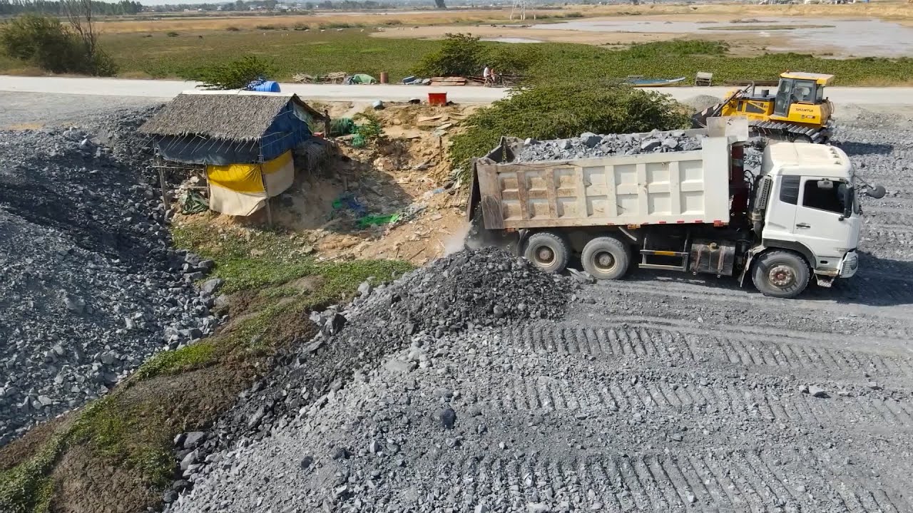 Amazing Activities Bulldozer Shantui Pushing Stone Into Mud Development of lowland areas