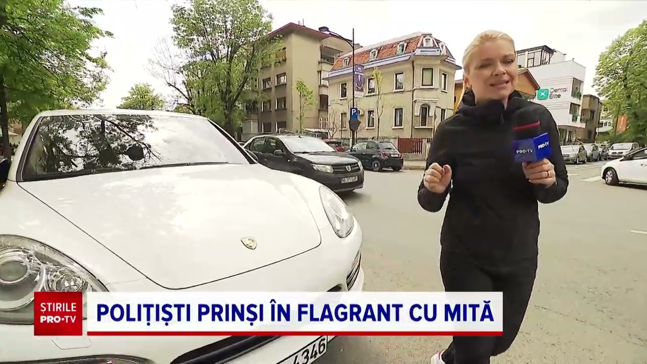 Doi polițiști de la Rutieră au fost prinși în flagrant când luau mită de la șoferi