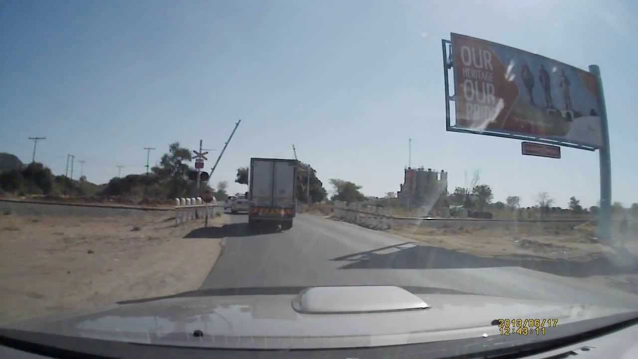 Diesel train crossing road in Gaborone, Botswana