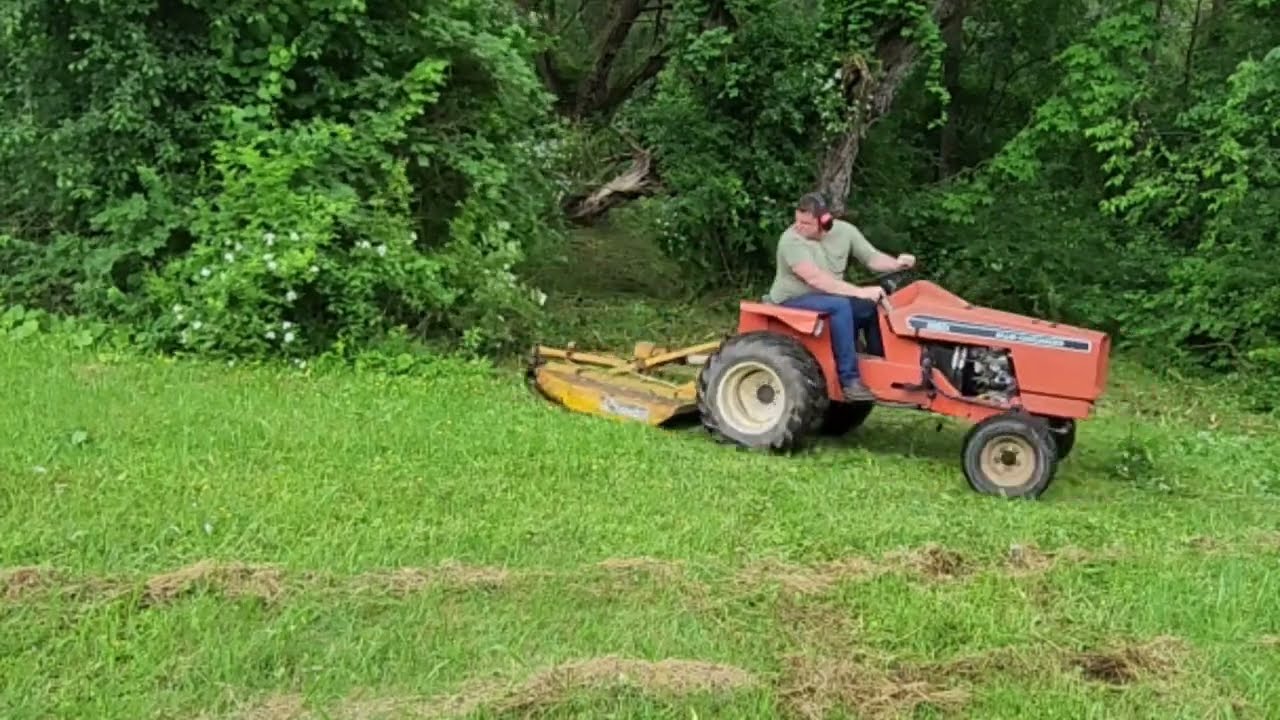 little tractor with a brush hog!!