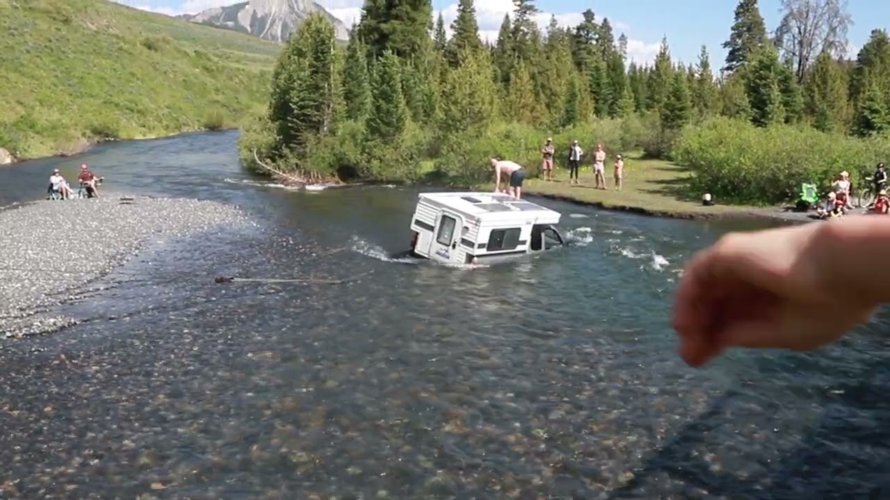 Truck getting Pulled out of the Slate River