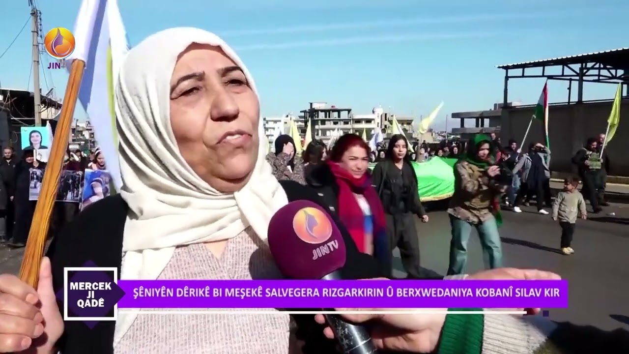 JINTV | ŞÊNIYÊN DÊRIKÊ BI MEŞEKÊ SALVEGERA RIZGARKIRIN Û BERXWEDANIYA KOBANÎ SILAV KIR