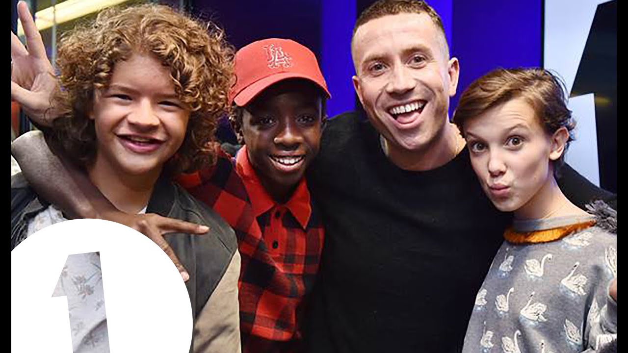 The cast of Stranger Things with Grimmy