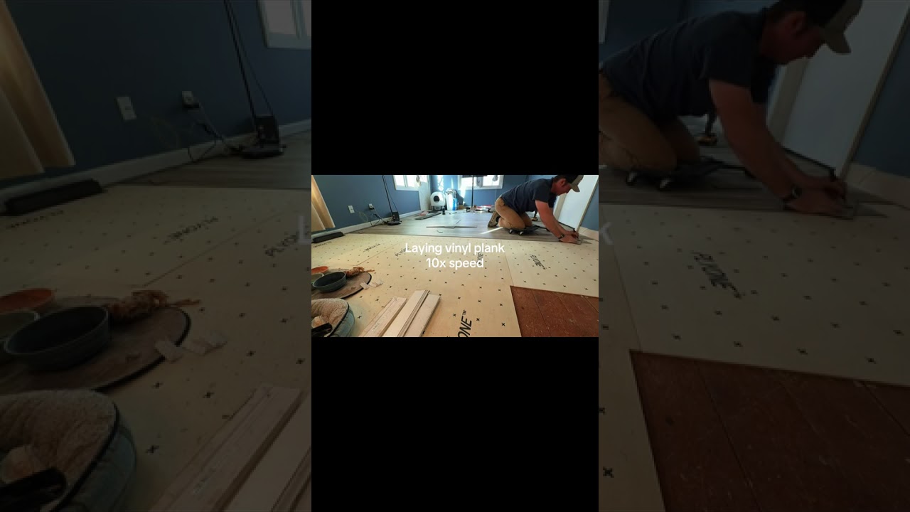 Laying vinyl plank flooring - kitchen remodel progress. 
