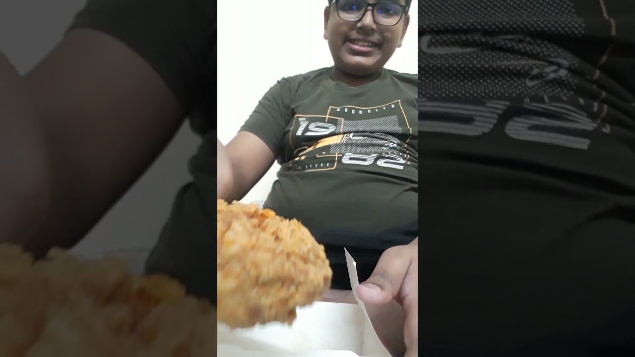 Abaan eating KFC