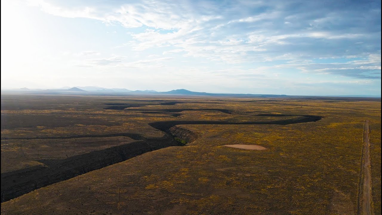 Aerial Scenic Video of Canyon Diablo, Railroad Bridge, and Two Guns