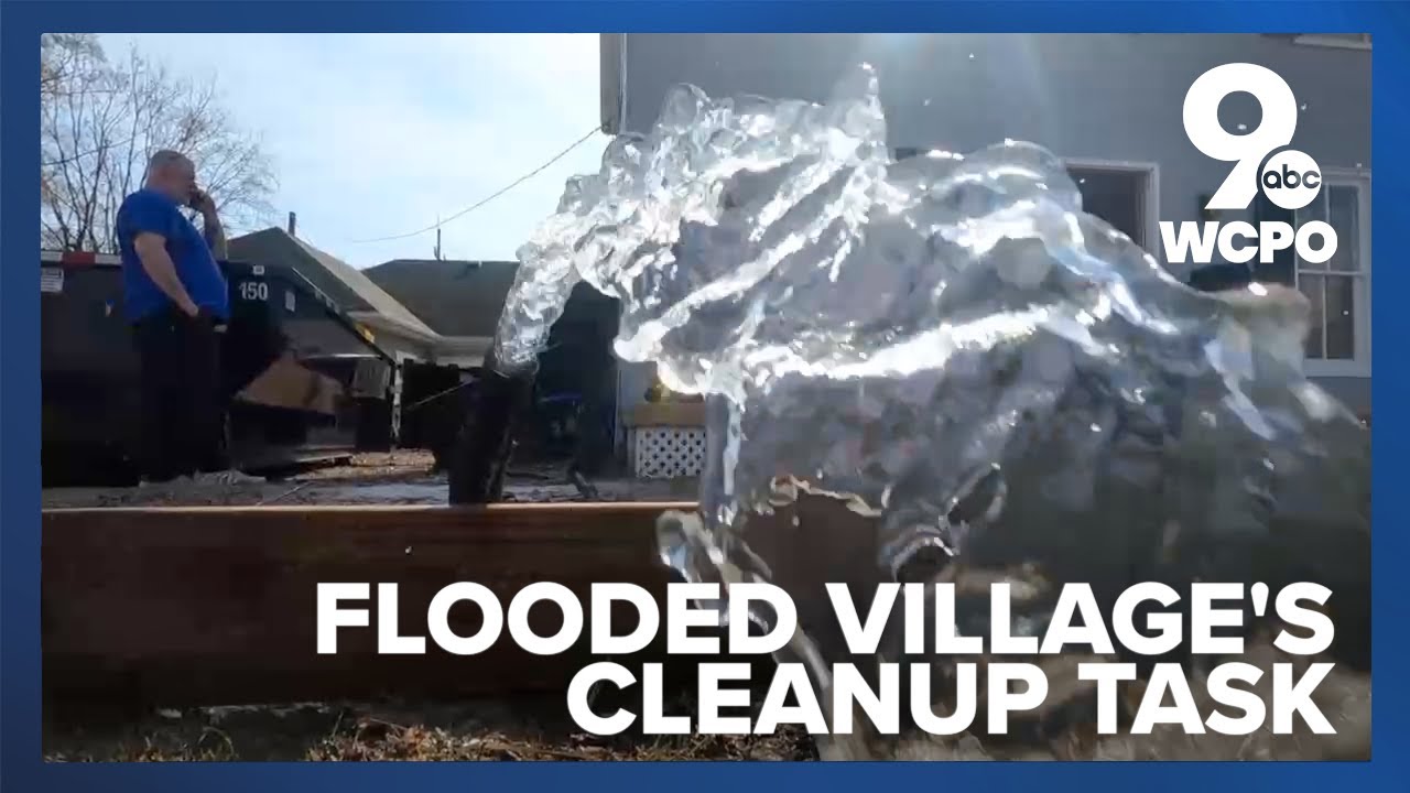Neighbors look for help digging themselves out of flood damage