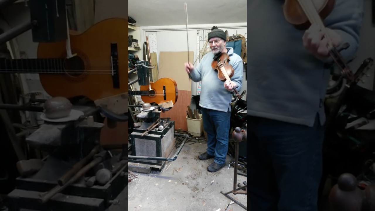 Jim Cooper, MacPherson's Rant on fiddle and hammer.