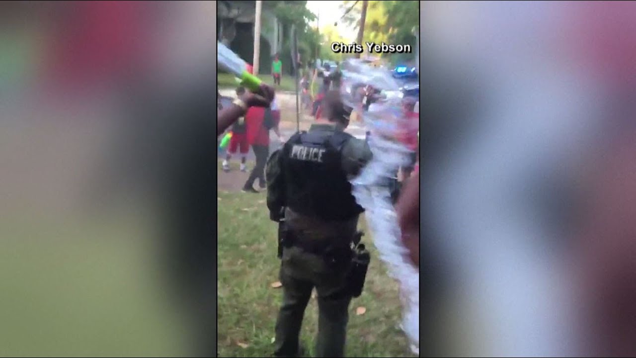 Neighborhood water gun fight leaves Atlanta police officers soaked