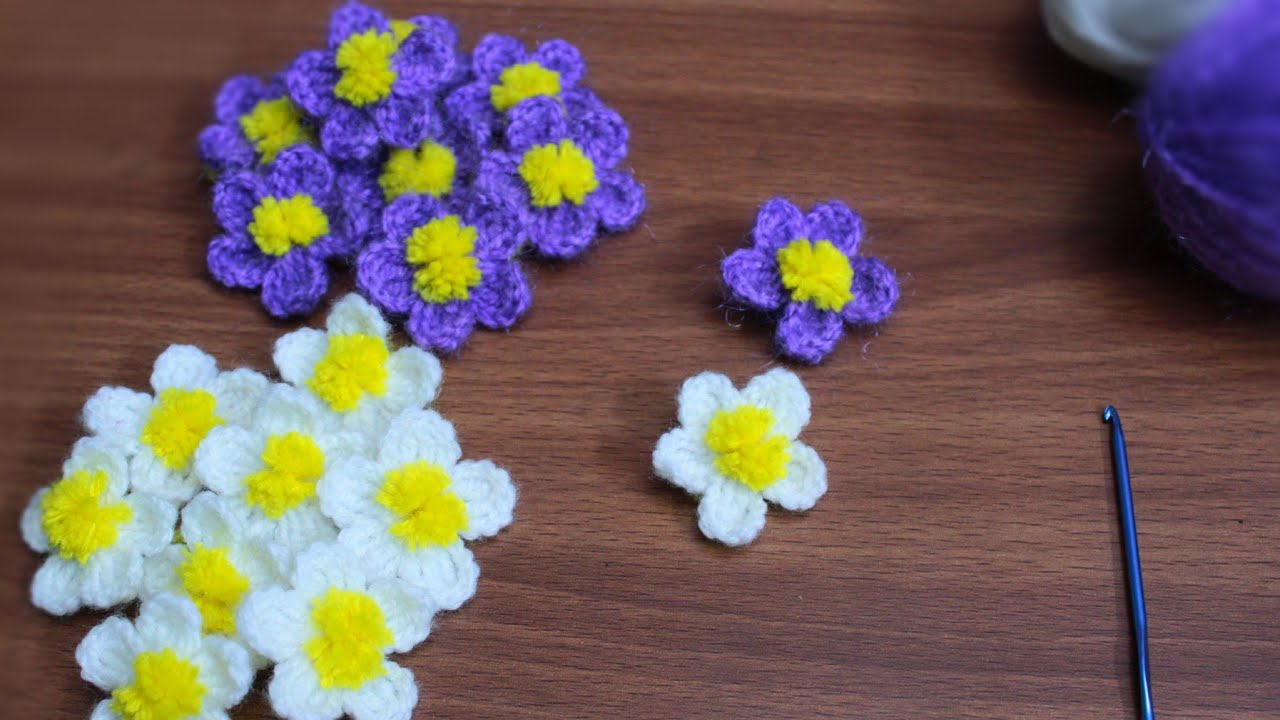 Beautiful 🌼Small flowers for toran#White & purple crochet flowers#woolen art#hand embroidery