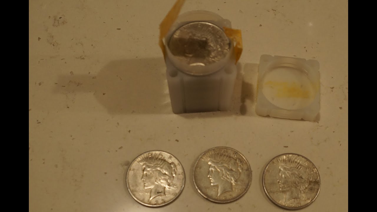 Treasure chest reveal, opening a safe full of old silver coins...