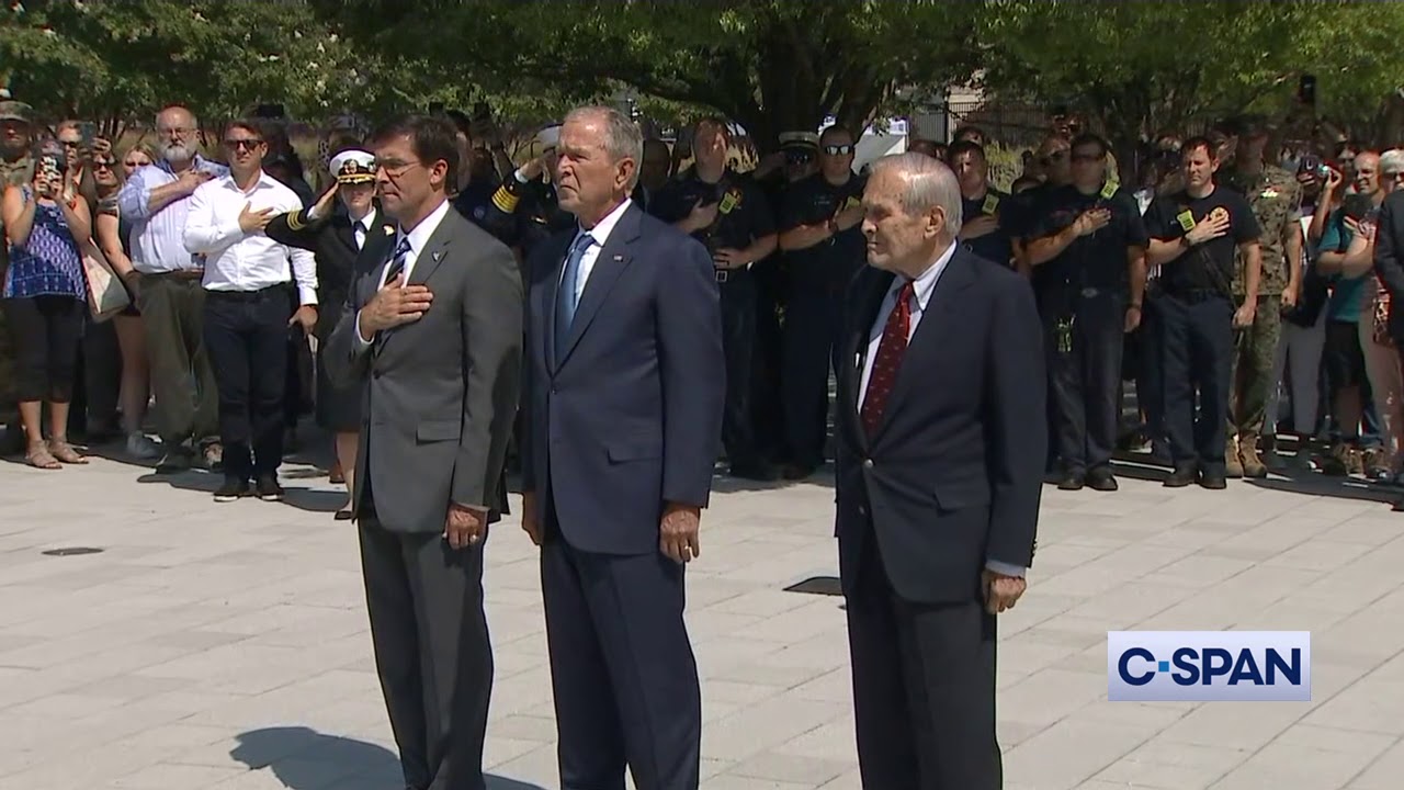 President George W. Bush places a wreath at Pentagon Memorial.