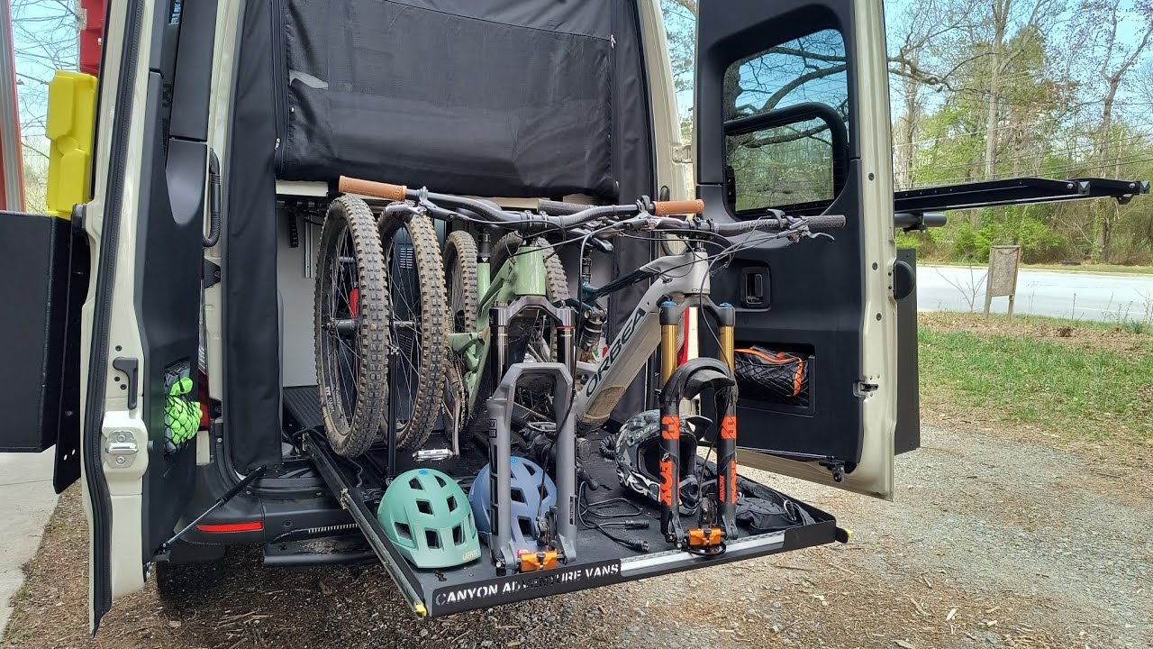 How We Carry 2 E-Bikes Inside + 2 MTBs Outside Our Winnebago Sprinter | Rebel Revel VanLife Setup